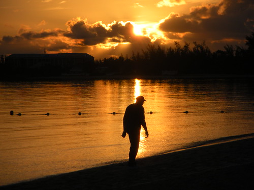 beach silhouette sunrise walking walk bahamas nassau cablebeach