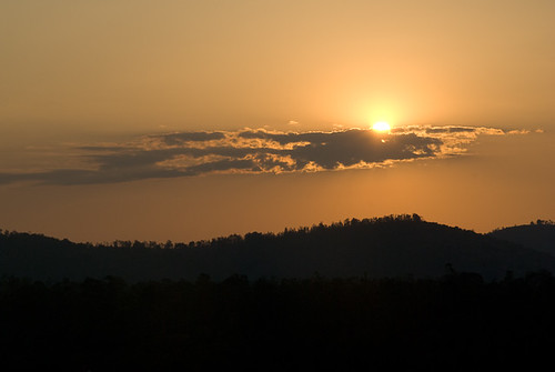 sun mountain tree silhouette yellow clouds sunrise circle mexico morelia shadows michoacan