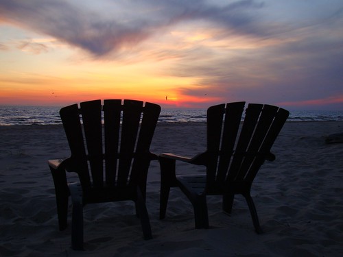 beach water evening chairs michigan lakemichigan grandhaven ottawacounty