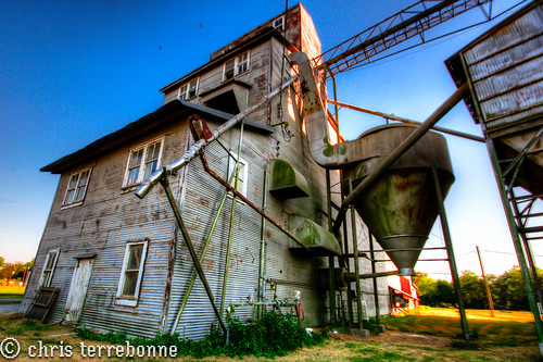 old sunset rural louisiana colorful decay farm manufacturing