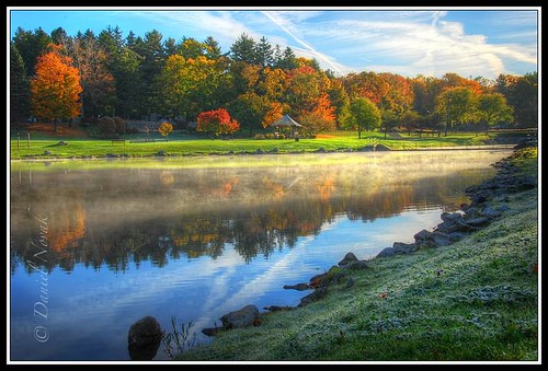 park morning blue autumn light red sky orange usa sun white mist lake ny newyork color reflection green fall nature colors grass yellow fog clouds sunrise season landscape early town us pond rocks frost glow seasons unitedstates bright bank upstate steam greenlake shore western