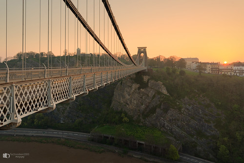 the clifton suspension bridge spanning picturesque avon gorge is symbol city bristol for almost 150 years this grade i listed structure has attracted visitors from all over world its story began 1754 with dream wine merchant who left legacy build england uk nikon d5200 lightroom night landscape architecture outdoor skyline building infrastructure water dusk serene d610 colour color sky black background sunrise