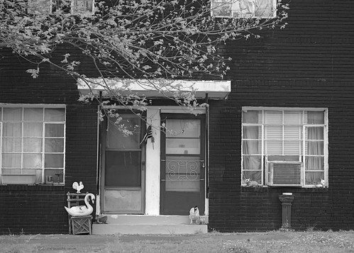cleveland oklahoma apartment screeneddoor entrance windows portal tree branches steps pawneecounty