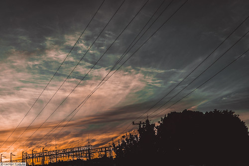 sunset d610 powerlines sun clouds wind evening auckland nikon 50mm 35mm urban fx highway road silhouette car landscape dark shadow