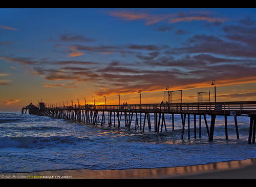imperialbeach pier sunset sandiego california nature landscape ocean reflection sand beach water clouds serene sea shoreline vacation shore romantic surf evening dusk sky pacific silhouettes orange pacificocean structure twilight scenic made dramatic man outdoor seascape cloudscape southerncalifornia sunsetbeach reflectivesurface reflectioninwater cloudssky oceanwaves beachsand paradise exotic recreation relaxing silhouette architecture