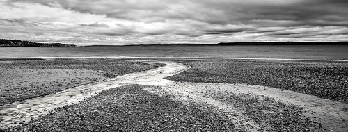 picnicpoint edmonds washington unitedstates us beach stream shoreline blackandwhite pugetsound clouds trinterphotos