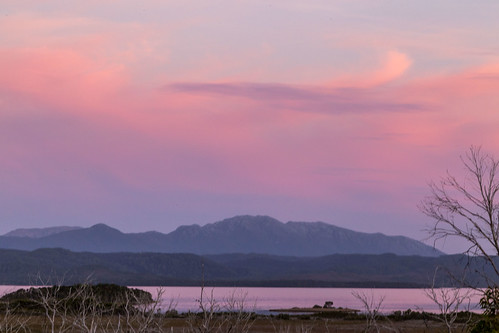 twilight westcoast sunset mountain clouds strahan tasmania australia au