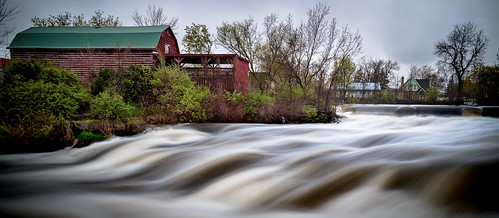 mill springside park swollen banks flooding flood runoff spring falls river ontario canada cans2s napanee