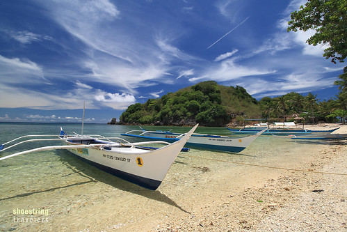 aladisland romblon beach island philippines landscape sea seascape water waterscape shore seaside coast sand boat clouds outdoor sky