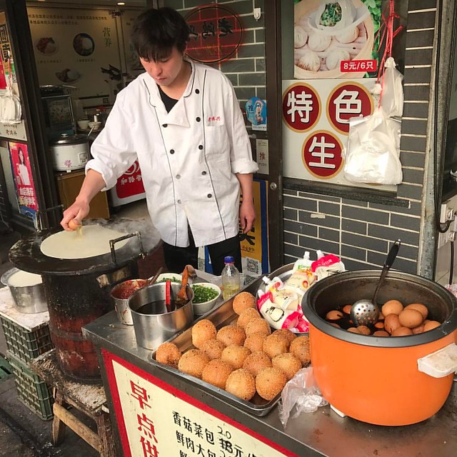 Jianbing (煎饼) (5 yuan / $0.72) - This crepe stand is just outside the apartment. Crepe dude is hooking it up with the wheat and mung bean flour pancake, Youtiao (油条), egg, cilantro, green onions, spicy chili paste, and a sweet hoisin sauce. Sooo good! Got
