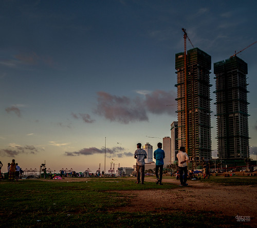 galleface colombo lka srilanka sunset people walk relax evening sky clouds travel wanderlust