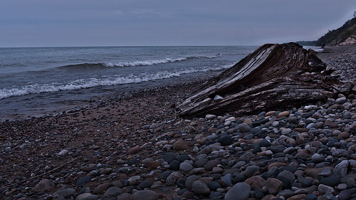 sand beach rocks pebble stump wave michigan lake lakemichigan puremichigan landscape lumix g lumixg