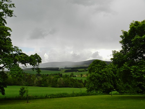 craigievar castle aberdeenshire rain thunder storm wet trees green shades afternoon clouds sweep countryside allanmaciver