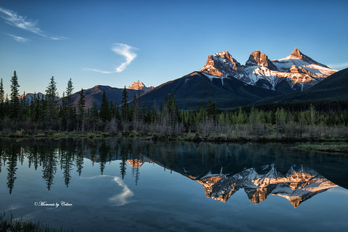 reflections sky scenery scenic landscape lake landscapes mountains mountainpeak trees nature nationalpark canmore canada alberta momentsbycelinecom clouds sunrise dawn summer threesisters policemanscreek water mountain serene forest