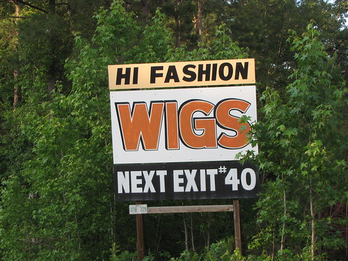 robesoncounty northcarolina ruralsouth interstate95 deepsouth sign wigsign roadsideadvertising billboard wigs hifashionwigs exit40 next hifashion