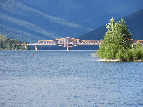 nelson bc british columbia canada bridge orange big lake water mountain trees green blue