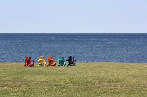 northlake pei canada colorful chairs view water ocean sky