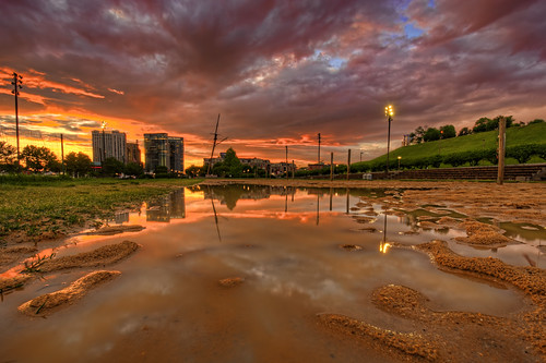 baltimore md maryland innerharbor sunrise morning clouds sky colorful dawn twilight rashfield beach volleyball puddle flooded harboreast skyline skyscrapers buildings courts sand hdr highdynamicrange