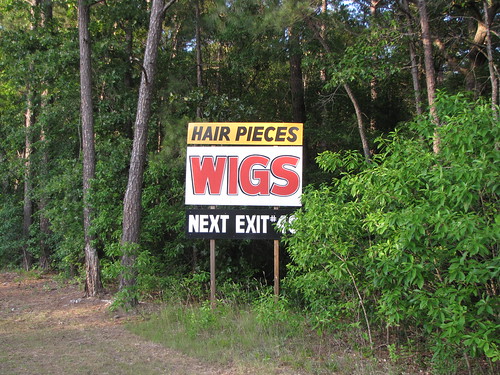 robesoncounty northcarolina ruralsouth interstate95 deepsouth sign wigsign roadsideadvertising billboard wigs hifashionwigs exit40 next hairpieces