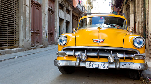 cuba cubanlife car yellow street caribbean retro old classic americanauto frontview headlights grill chrome lahabana havana havanna