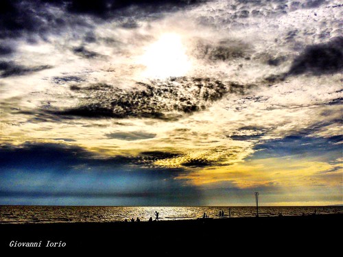onde sole raggi fotografia coolpix iphone nikon fregene cielo nuvole sky sun spiaggia mare tramonto sunset