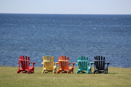 northlake pei canada view colorful chairs ocean water sky