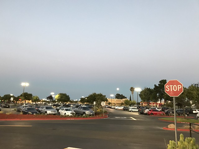 huge full moon, parking lot