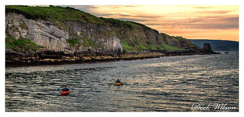 canoeists canoe paddle sea antrimcoast portmuck harbour larne landscape seascape northernireland sunset clouds canon7dmkii