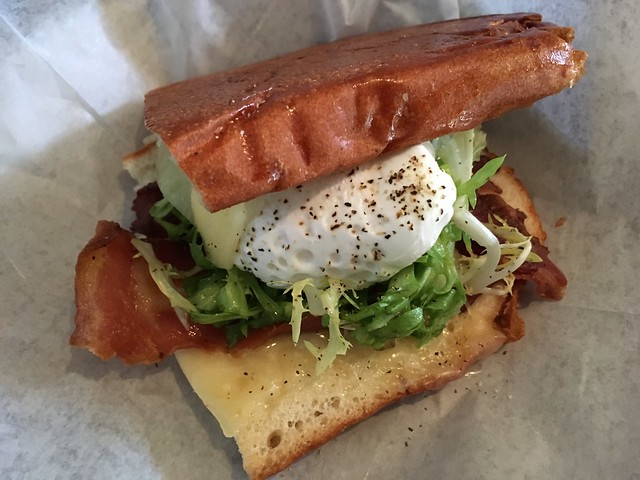 Bacon and poached egg breakfast sandwich - Northside Social
