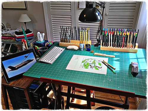 artstudios drawingtable cuttingmat pencils coloredpencils tasklamp ipad keyboard erasers pencilsharpeners stevefrenkel