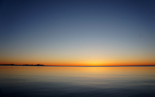 lake sunrise blue orange colours calm early toronto cityscape landscape ontario morning