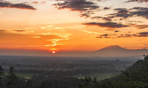 spotriyadi prambanan sunrise java indonesia golden volcano
