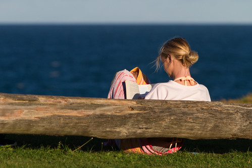 wollongong illawarra nsw south coast bulli beach woman girl reading book bovel sea seaside ocean view log sitting resting sunny
