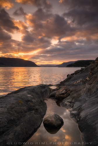basin beach cliffs clouds evening fjord goldenhour inlet nordiclight norway ocean puddle reflections rock saltdalsfjorden scandinavia sea seashore sky snow sunrays sunset water waterbasin dawn dusk golden mountains nature noperson outdors stone travel