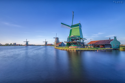 dutch europe goldenhour holland netherlands sunset water waterreflection windmill zaanseschans