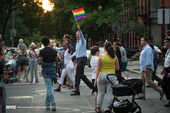Mayor Bill de Blasio and First Lady Chirlane McCray march in the Brooklyn Pride Parade