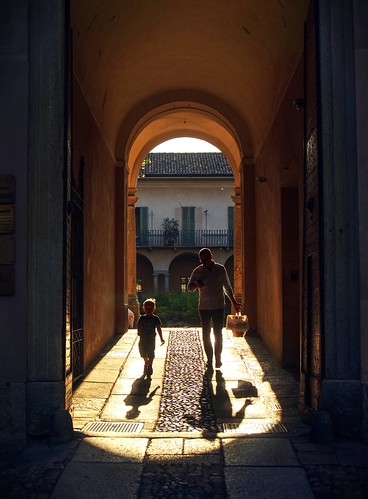 varese italy hallway child people walk walking light shadow lightsandshadows town sunset 1xp raw nex6 photomatix selp1650 hdr qualityhdr qualityhdrphotography palazzoestense palace silhouette fav200