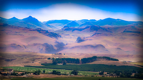 spring landscape businessindustry plants mountains rural homes haze trees summer country wildlife distance travel seasons agriculture calm farm quiet marsing idaho field business industries industry season caldwell unitedstates us