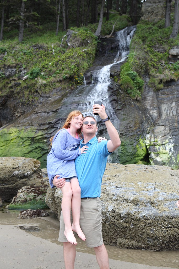 selfie on Oregon Beach by waterfall