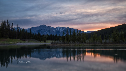 clouds colours canada calm cascadeponds alberta trees reflections mountains mothernature sky scenery scenic landscape momentsbycelinecom lake water banff banffnationalpark travel exploring grass dawn sunrise reds blue mountain