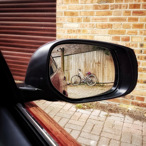 bike bicycle cycle cycling pedals wheels twowheel reflection reflected mirror side rearview rear view car phone mobile snap shot passingby drive courtyard backyard house home pov point android samsung samsunggalaxys7 galaxy s7 square squareformat app snapseed
