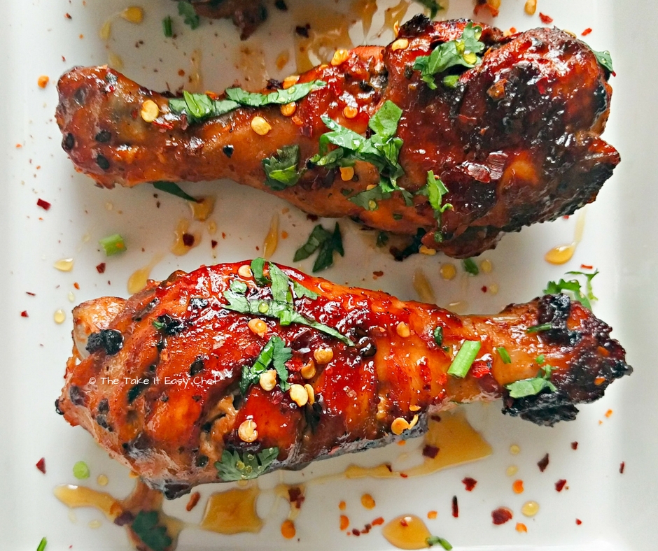 Honey fried chicken drizzled with honey, and garnished with coriander leaves and chilli flakes