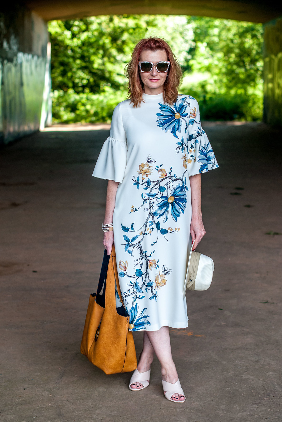 Wedding guest or garden party outfit: Marks & Spencer floral midi dress with flared sleeves \ nude cage heel mules \ pearl sunglasses | Not Dressed As Lamb, over 40 style