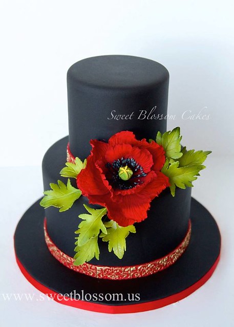 Black Cake with Red Poppy and Little Touch of Gold by Sweet Blossom Cakes