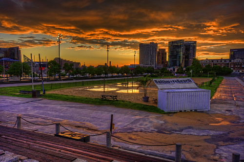baltimore md maryland innerharbor sunrise morning clouds sky colorful dawn twilight rashfield beach volleyball puddle flooded skyline skyscrapers harboreast buildings courts sand hdr highdynamicrange