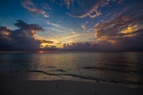maldives sunset beach sand