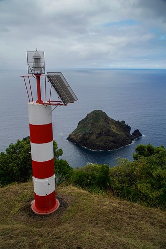 lighthouse view rock beach ocean sea island santa maria portugal azores sel18105g