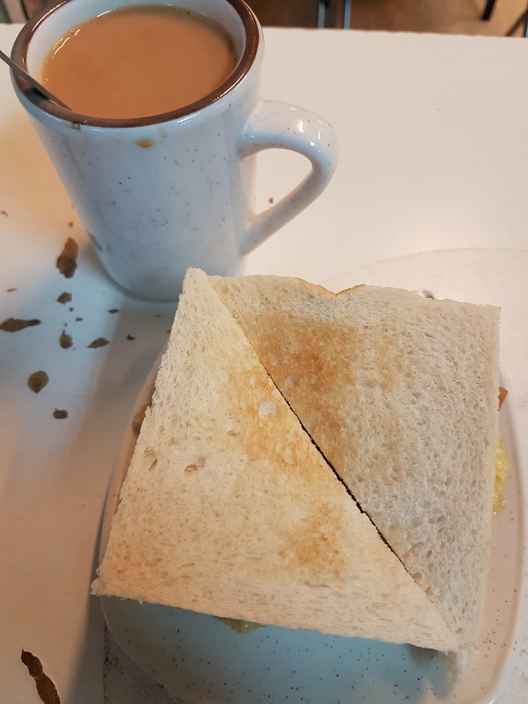Sandwich toast w/twin egg  $4 Tea $2 @ Tesstaurant KL Cafe Wisma Cosway