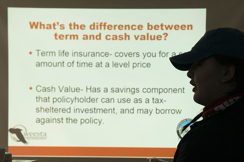 Nadia Walluk asks a question during a discussion about life insurance in a financial literacy course offered to tribal interns and others interested in managing their money.