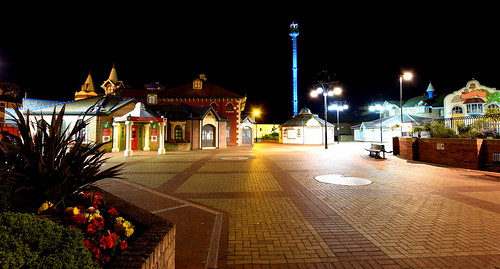 interestingness interesting bedtimeintoytown thechildrensvillage rhyl northwales seaside holidays wales cymru village town playtime buildings shops architecture kiosks coast coastal longexposure night summer outdoor evening lights lighting streetlights paving seating benches skytower illuminated colours colourful reflections shadows flowers railings quiet calm peaceful relaxing tranquil whimsical playful quaint fanciful unusual curious coordintes533191°n34916°w shot